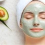 A woman with a face mask with an avocado