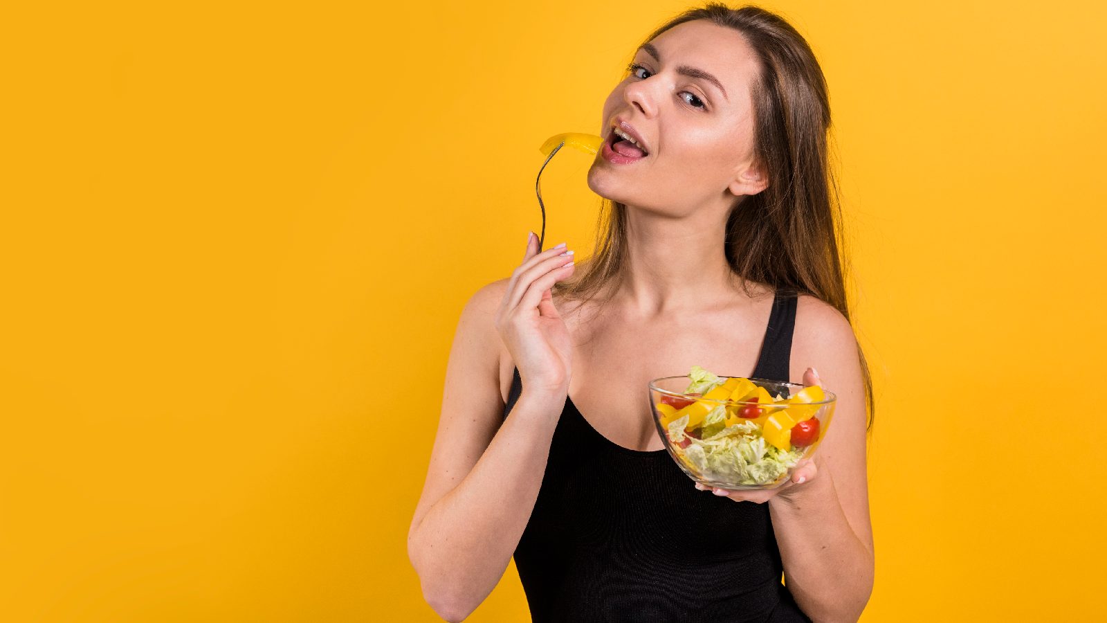 Woman eating from a bowl