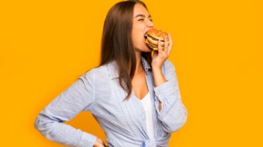 Woman eating a burger