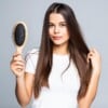 A woman having less hairfall after using collagen for hair growth