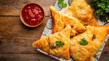 A plate full of samosas