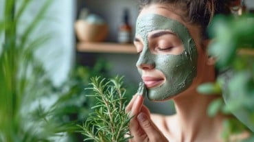 A woman with a green mask