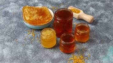 Bottles of honey and maple syrup