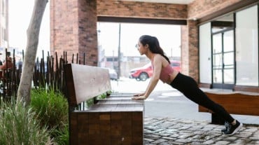 A woman doing pull ups