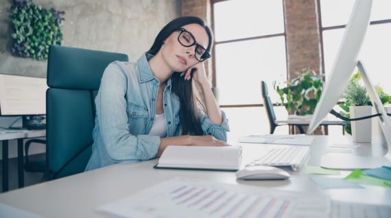 Women taking a power nap at office