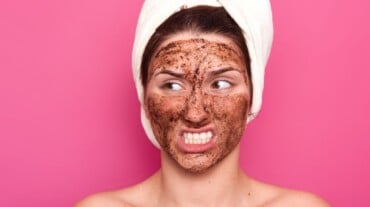 A woman using poop face mask