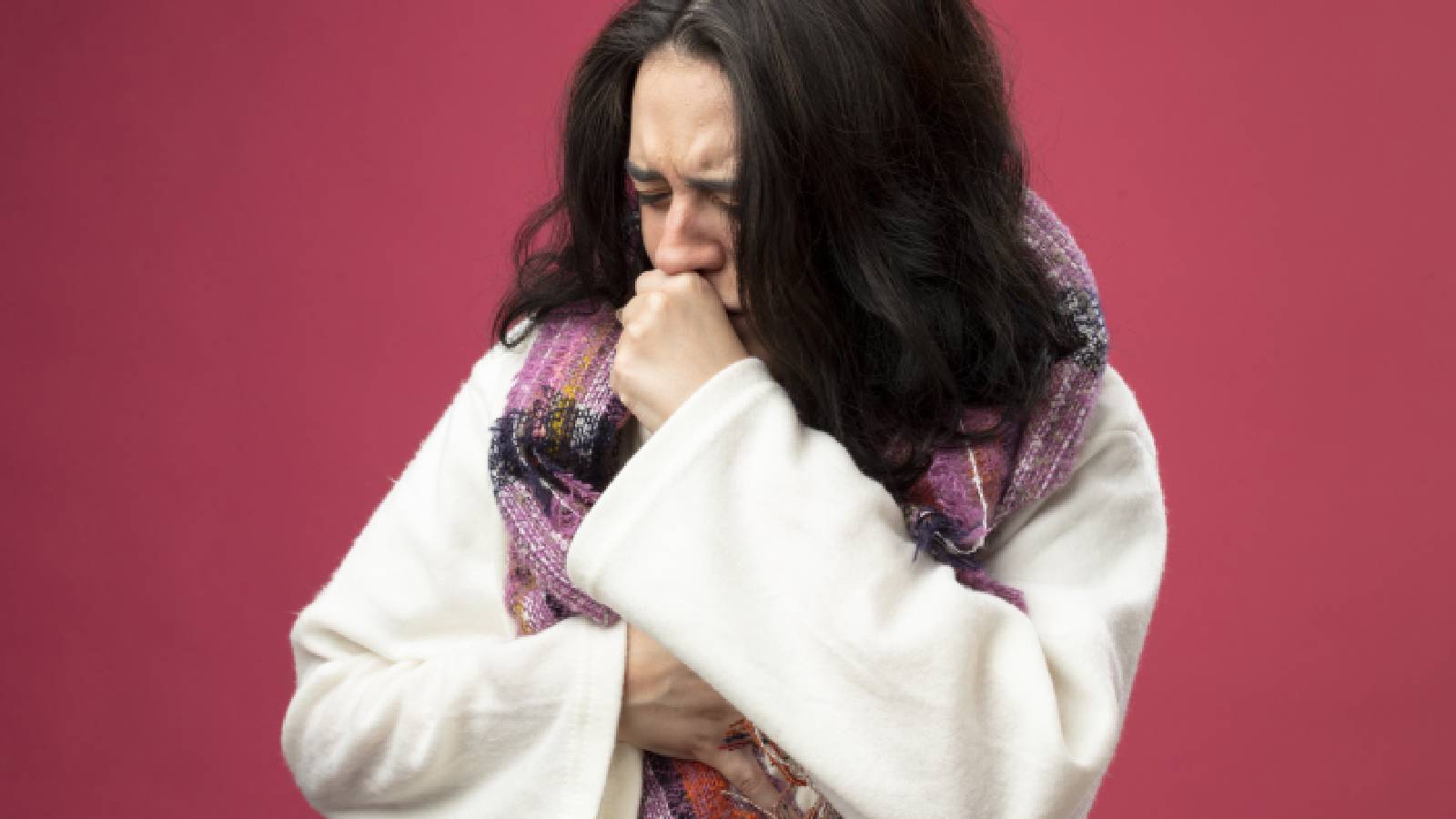 a woman coughing